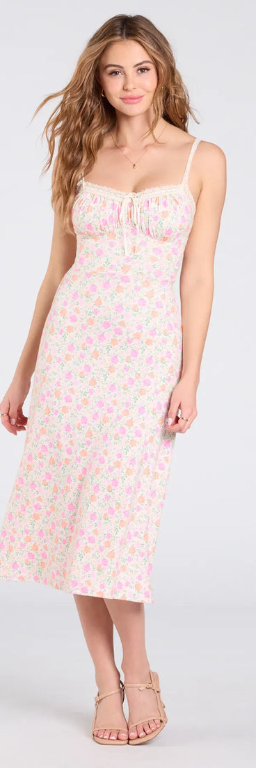 Step into milestone moments with the Darling Vibe Ditsy Floral A-Line Midi Dress, a standout in ivory dresses perfect for bridal showers, anniversary celebrations, and 2025 grad looks.