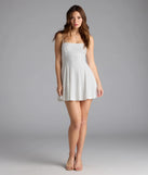 Shine with confidence, elegance, and standout style in the Sweet Look Eyelet Knit Skater Dress—a white graduation dress designed with a fresh silhouette and the latest trends.