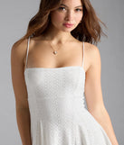 Feel confident and photo-ready in the Sweet Look Eyelet Knit Skater Dress, a white graduation dress perfect for 2025 ceremonies and parties.