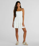 Shine with confidence, elegance, and standout style in the Feeling Amore Tie-Back A-Line Eyelet Mini Dress—a white graduation dress designed with a fresh silhouette and the latest trends.