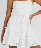 Shine with confidence, elegance, and standout style in the Feeling Amore Tie-Back A-Line Eyelet Mini Dress—a white graduation dress designed with a fresh silhouette and the latest trends.