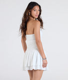 The Looking Sweet Eyelet Knit Tiered Skater Dress in white brings sleek style to any graduation outfit, from cap and gown to after-party.