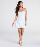 Make a bold statement in the Looking Sweet Eyelet Knit Tiered Skater Dress in white, the perfect spring dress for weddings, cocktail hours, nights out, and/or seasonal celebrations.