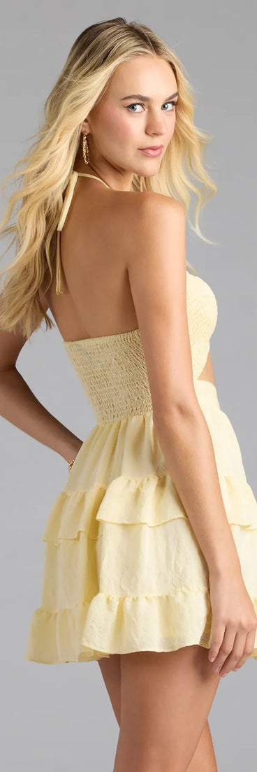 Soak up the season in the Blissful Cutie Halter Cutout Skater Dress, a yellow sundress styled for easy days, outdoor plans, and everything in between.