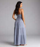 Soak up the season in the Breezy Like Me Sleeveless Ruffled Maxi Dress, a denim blue sundress styled for easy days, outdoor plans, and everything in between.
