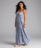Soak up the season in the Breezy Like Me Sleeveless Ruffled Maxi Dress, a denim blue sundress styled for easy days, outdoor plans, and everything in between.