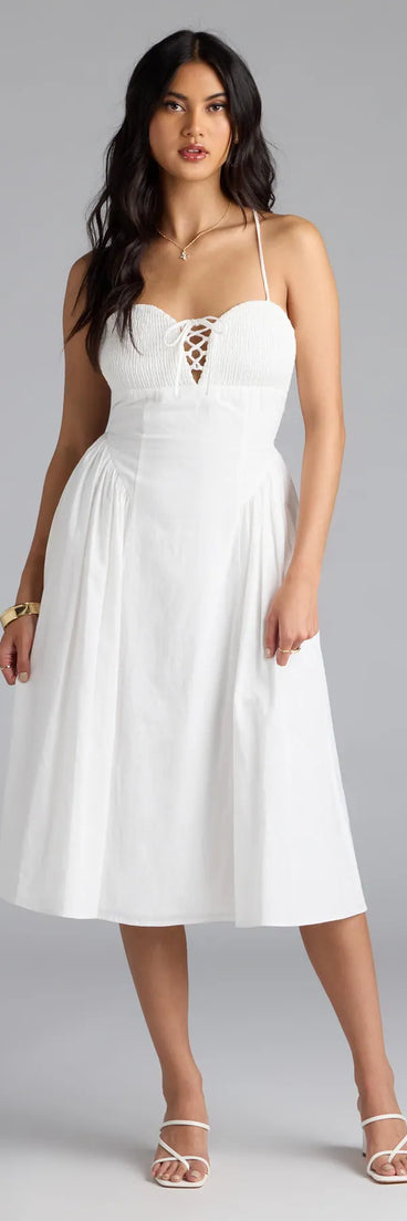 Step into summer looking effortlessly chic in the Easy And Breezy Lace-Up Midi Dress With Pockets in ivory, a must-have Windsor dress for your warm-weather wardrobe.