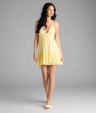 Shine with confidence, elegance, and standout style in the Ace The Test Open Tie Back Skater Dress—a yellow graduation dress designed with a fresh silhouette and the latest trends.