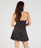 Whether you're headed to brunch or running errands, the Exquisite Charm A-Line Floral Mini Dress in black delivers effortless style in a breathable, go-to casual dress.