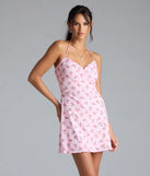 Whether you're headed to brunch or running errands, the Falling For Charm Strappy Open Back Floral Mini Dress in pink delivers effortless style in a breathable, go-to casual dress.