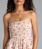 The Flirty Fave Floral Ruffled Skater Dress in ivory brings sleek style to any graduation outfit, from cap and gown to after-party.