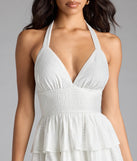 The Sunset Happy Hour Ruffled Skater Dress in white brings sleek style to any graduation outfit, from cap and gown to after-party.
