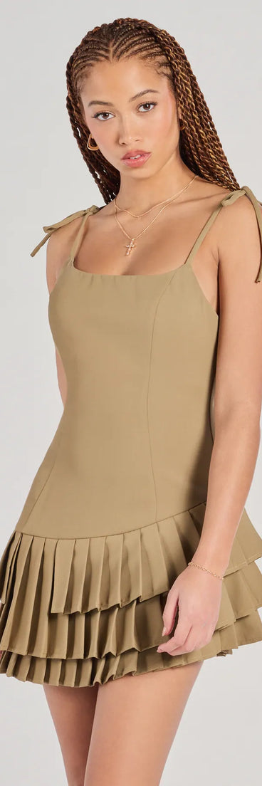 Make a bold statement in the Pleat The Way Scoop Neck Mini Dress in olive green, the perfect green dress for weddings, cocktail hours, nights out, and/or seasonal celebrations.