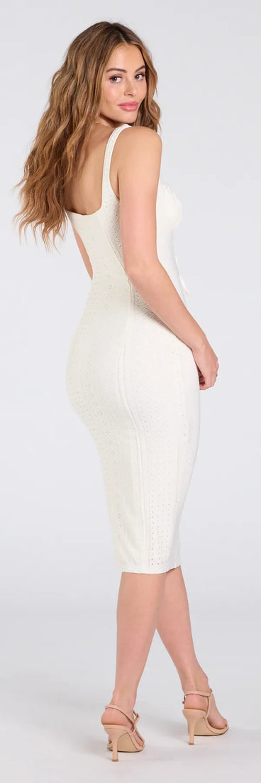 Make a bold statement in the Blissful Cutie Eyelet Bodycon Midi Dress in ivory, the perfect summer dress for weddings, cocktail hours, nights out, and/or seasonal celebrations.