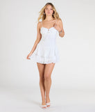 Feel confident and photo-ready in the Sweetest Outing Tie Back Ruffled Skater Mini Dress, a white graduation dress perfect for 2025 ceremonies and parties.