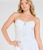 The Sweetest Outing Tie Back Ruffled Skater Mini Dress in white brings sleek style to any graduation outfit, from cap and gown to after-party.