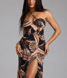 Soak up the season in the Island Hottie Tropical Halter Slit Maxi Dress, a black sundress styled for easy days, outdoor plans, and everything in between.