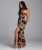 Soak up the season in the Island Hottie Tropical Halter Slit Maxi Dress, a black sundress styled for easy days, outdoor plans, and everything in between.