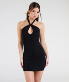 Make a bold statement in the Timelessly Flirty Halter Twist Bodycon Mini Dress in black, the perfect summer dress for weddings, cocktail hours, nights out, and/or seasonal celebrations.