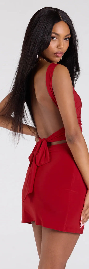 Bring high-impact style to your nightlife in the Mysteriously Stunning Low Tie Back Mini Dress, a bold red club dress made for dancing, parties, and unforgettable nights.