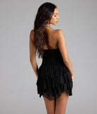 Bring high-impact style to your nightlife in the Sweet But Spicy Halter Cutout Ruffle Skater Dress, a bold black club dress made for dancing, parties, and unforgettable nights.