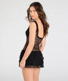 Flaunt your silhouette in the tight Dainty And Divine Sheer Lace Bodycon Ruffle Mini Dress in black, a bodycon dress that empowers your look with bold style and effortless edge.