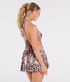 Bring high-impact style to your nightlife in the In The Wild Halter Leopard Ruffle Mini Dress, a bold natural club dress made for dancing, parties, and unforgettable nights.