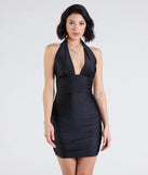 Make a bold statement in the Sultry And Dreamy Open Back Halter Mini Dress in black, the perfect summer dress for weddings, cocktail hours, nights out, and/or seasonal celebrations.