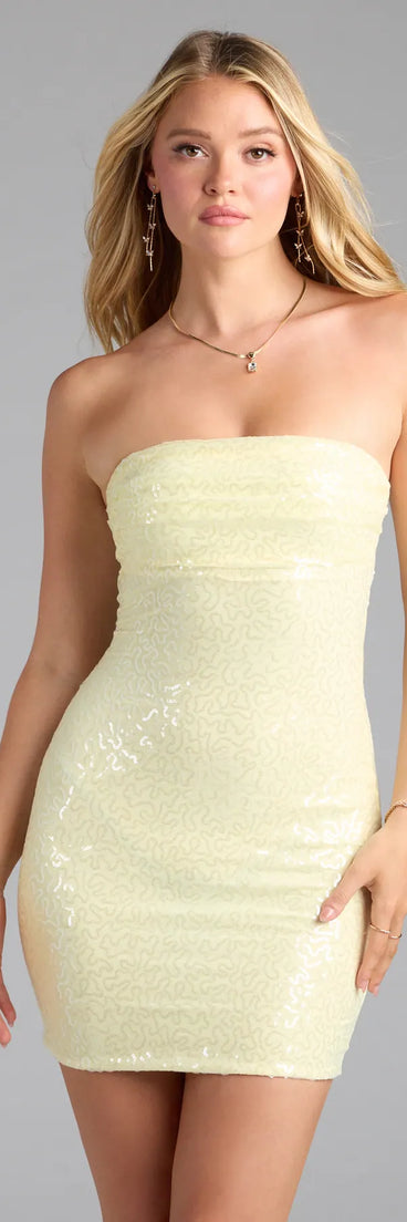 Feel ready for every dance floor moment or feed-worthy reel in the Shimmer All Night Strapless Sequin Mini Dress, a yellow homecoming dress designed to own your moment.