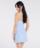 The Feelin' Glitzy Glitter Knit A-Line Mini Dress in light blue brings sleek style to any graduation outfit, from cap and gown to after-party.