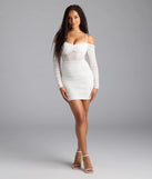 Step into summer looking effortlessly chic in the See Me Shining Glitter Off-The-Shoulder Mini Dress in ivory, a must-have Windsor dress for your warm-weather wardrobe.