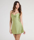 Feel confident and photo-ready in the Sweetest Vibe V-Neck Tie A-Line Dress, a lime green graduation dress perfect for 2025 ceremonies and parties.
