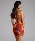 Bring high-impact style to your nightlife in the Step Up Abstract Print Cutout Mini Dress, a bold orange club dress made for dancing, parties, and unforgettable nights.
