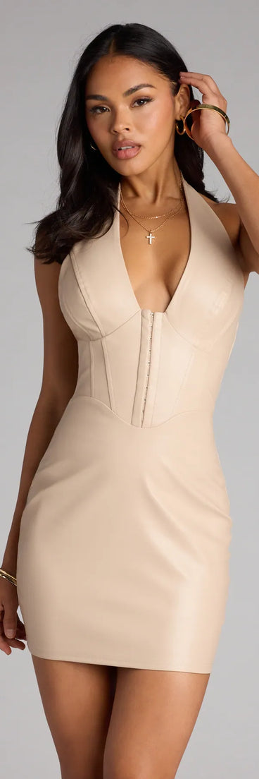 The Bold Allure Faux Leather Corset Mini Dress is your new go-to ivory dress—effortless, versatile, and made to update your fall style in seconds.