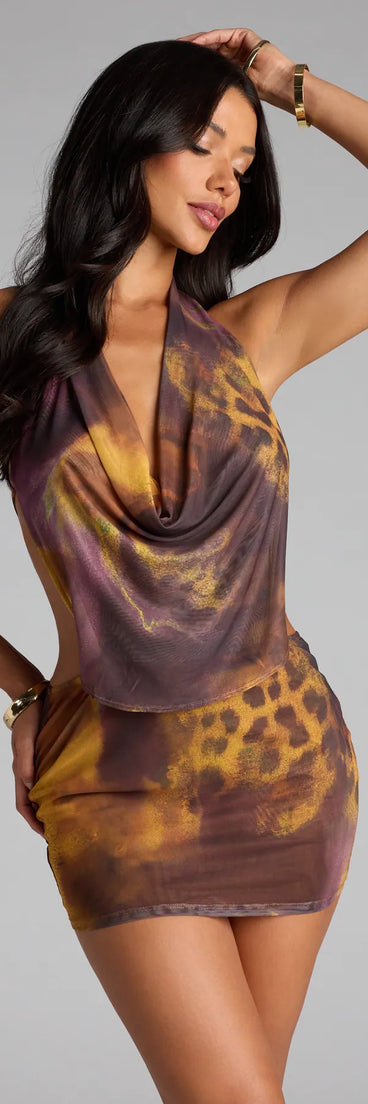 The Untamed Energy Mesh Cowl Halter Mini Dress is your new go-to brown dress—effortless, versatile, and made to update your fall style in seconds.