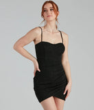 Step into winter chic with the Let It Glitz Glitter Sweetheart Mini Dress, a black mini dress featuring an above-the-knee cut ideal for cocktail parties, festive gatherings, or clubwear.