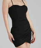 The Let It Glitz Glitter Sweetheart Mini Dress is a stunning black mini dress with a short hem, designed to be the perfect winter cocktail dress or night-out look for the holiday season.