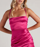 Bring high-impact style to your nightlife in the Sultry Strappy Back Satin Mini Dress, a bold fuchsia club dress made for dancing, parties, and unforgettable nights.