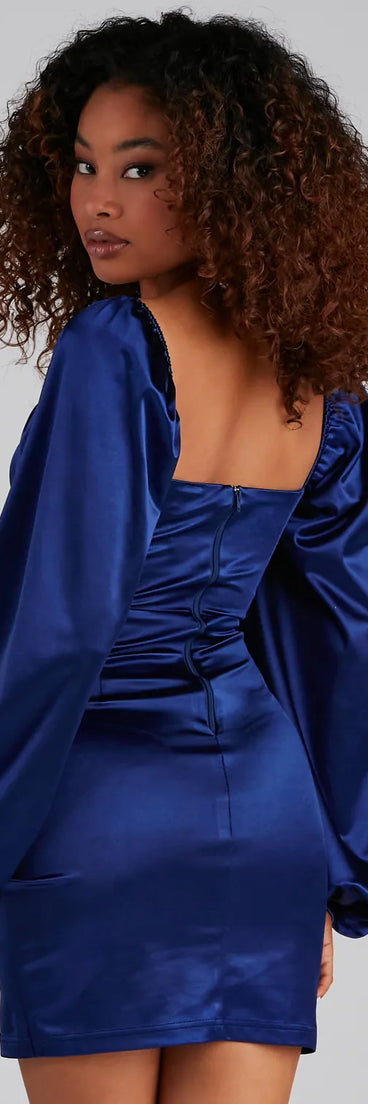 Revamp your 2025 wardrobe with this chic addition, the Lavish Satin Sweetheart Wrap Dress in navy, perfect for elevating your style in the new year.