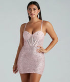 Turn heads in the beaming Dusk Til' Dawn Sequin Corset Mini Dress, a stunning pink sequin dress designed to add sparkle and elegance to your next night out or special occasion.