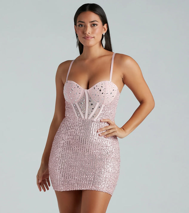 Turn heads in the beaming Dusk Til' Dawn Sequin Corset Mini Dress, a stunning pink sequin dress designed to add sparkle and elegance to your next night out or special occasion.