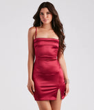 Step into winter chic with the Pleats To Meet You Satin Slit Dress, a burgundy mini dress featuring an above-the-knee cut ideal for cocktail parties, festive gatherings, or clubwear.