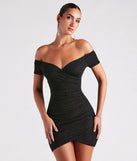 Feel confident and photo-ready in the Radiant Glitter Off-The-Shoulder Dress, a black graduation dress perfect for 2025 ceremonies and parties.
