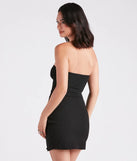 Flaunt your silhouette in the tight Queen Of The Scene Crepe Strapless Dress in black, a bodycon dress that empowers your look with bold style and effortless edge.