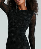 Revamp your 2025 wardrobe with this chic addition, the Step Up The Shine Studded Rhinestone Mini Dress in black, perfect for elevating your style in the new year.