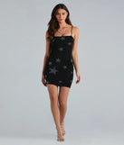 Revamp your 2025 wardrobe with this chic addition, the Star Tonight Rhinestone Mesh Mini Dress in black, perfect for elevating your style in the new year.