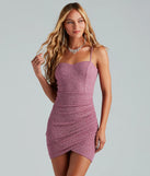Step into winter chic with the Forever Perfect Glitter Rhinestone Party Dress, a raisin purple mini dress featuring an above-the-knee cut ideal for cocktail parties, Valentine's Day outfits, or clubwear.