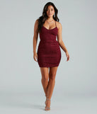 Make a bold statement in the My Sparkle Glitter Lace-Up Mini Dress in wine, the perfect fall dress for weddings, cocktail hours, nights out, and/or seasonal celebrations.