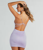 Feel confident and photo-ready in the Time To Shimmer Glitter Strappy Back Mini Dress, a lavender graduation dress perfect for 2025 ceremonies and parties.