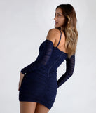 Step into summer looking effortlessly chic in the See Me Shining Glitter Off-The-Shoulder Mini Dress in navy blue, a must-have Windsor dress for your warm-weather wardrobe.